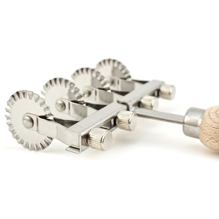 https://www.italiancookshop.com/cdn/shop/products/four-wheel-fluted-pasta-cutter_460x@2x.jpg?v=1647466698